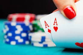 Live roulette wheel with dealer spinning
